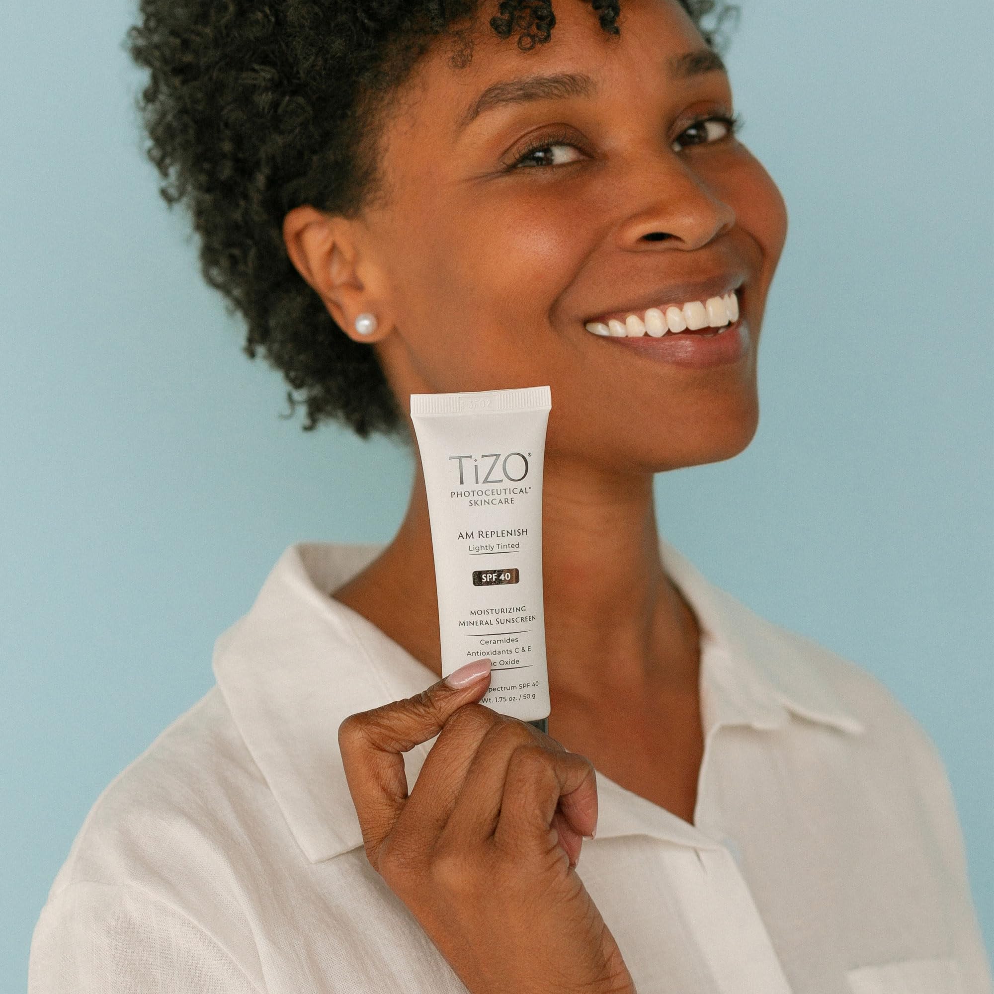 Ambient shot highlights natural tint and skin-friendly finish from TIZO AM Replenish.