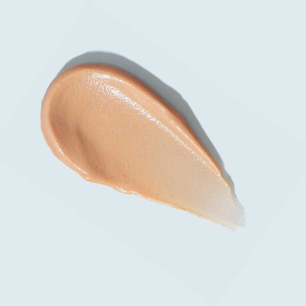 Close-up of the cap on TIZO AM Replenish SPF 40 for reliable sun protection.