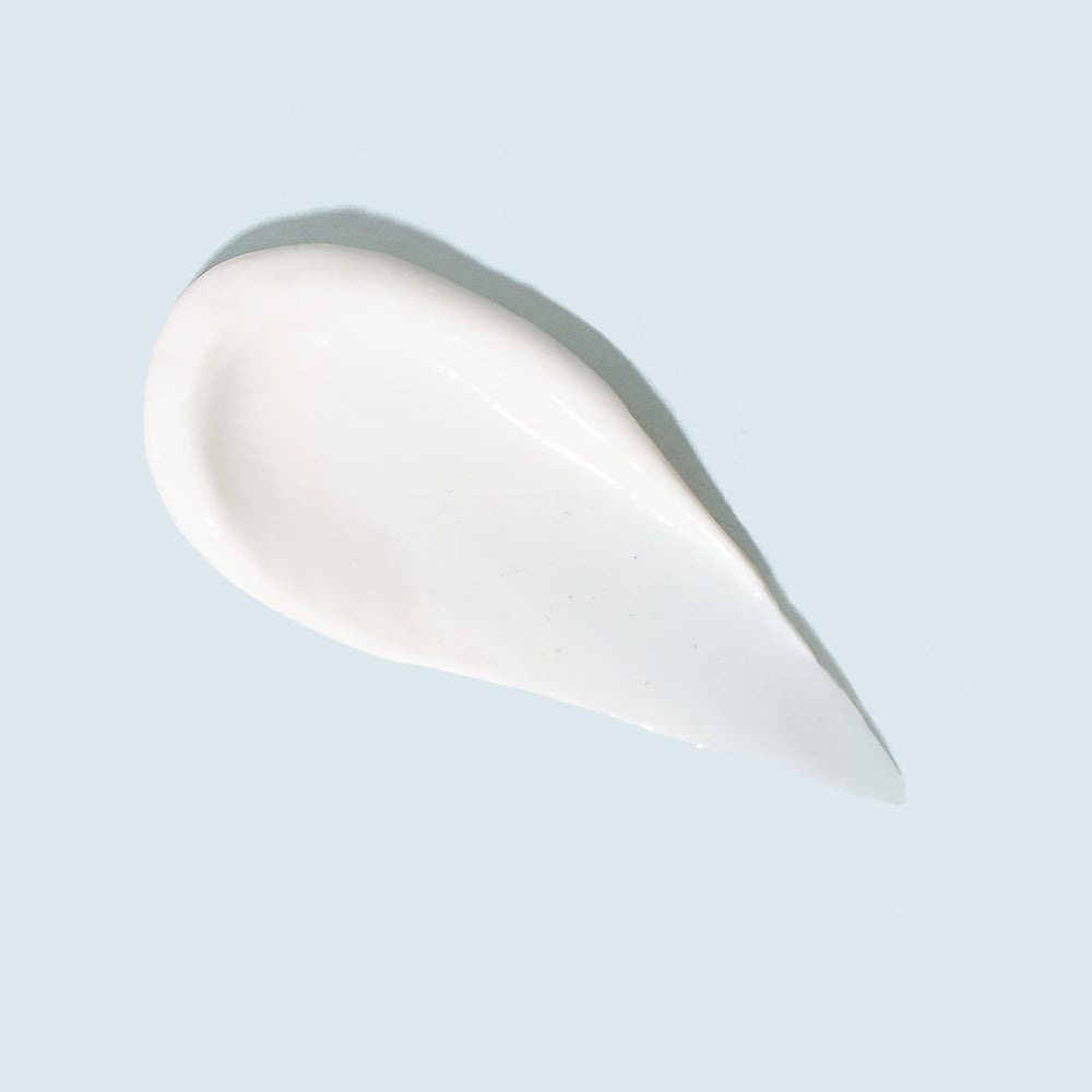 TiZO Ultra Zinc sunscreen spread on skin for a sheer, natural finish.