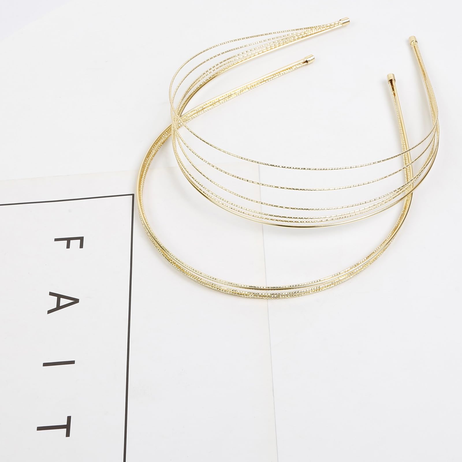 Tobeffect headbands worn with updo demonstrates secure styling and elegance.
