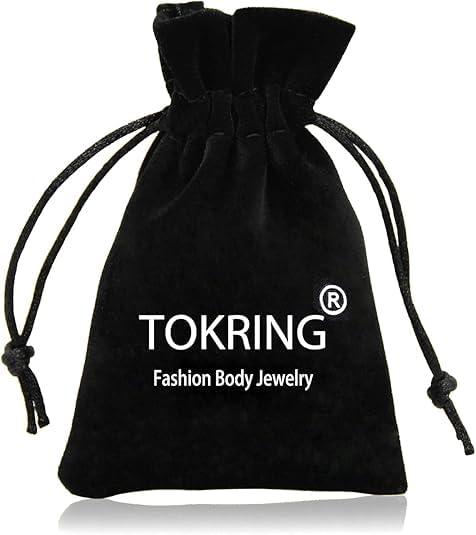 TOKRING marker pen helps plan placement before piercing.