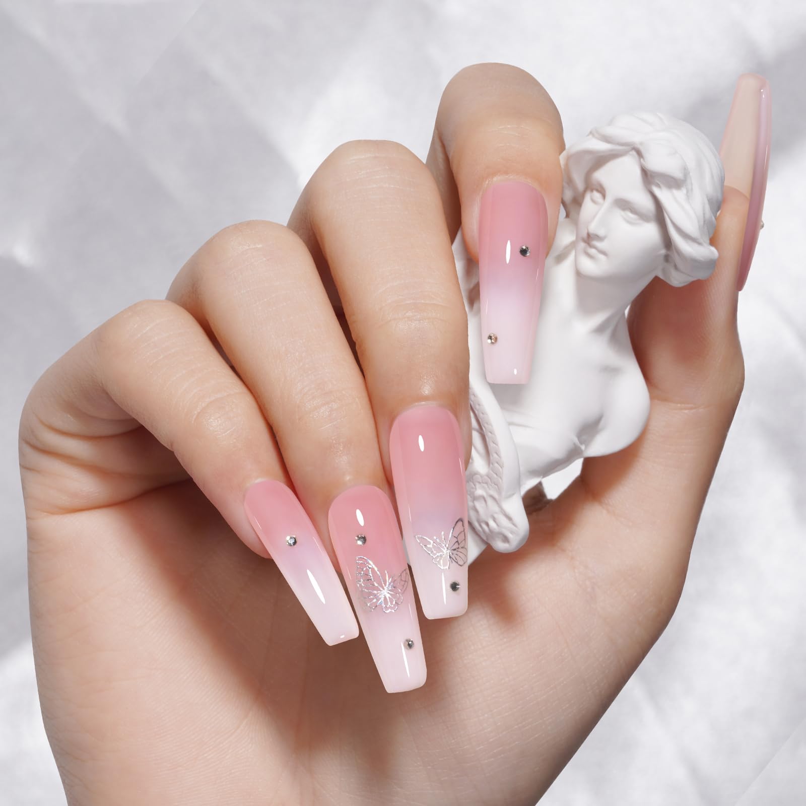 TOMICCA Jelly Pink on nails with a French manicure look.