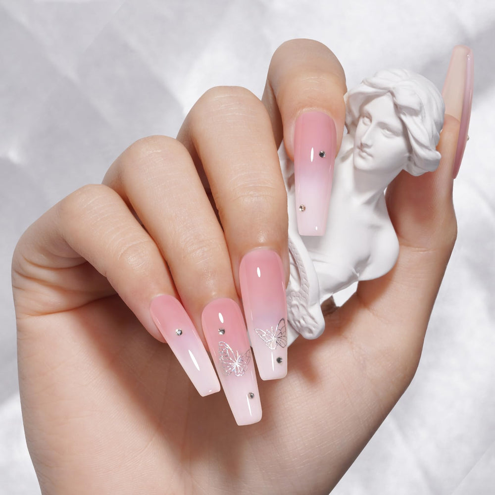 TOMICCA Jelly Pink on nails with a French manicure look.