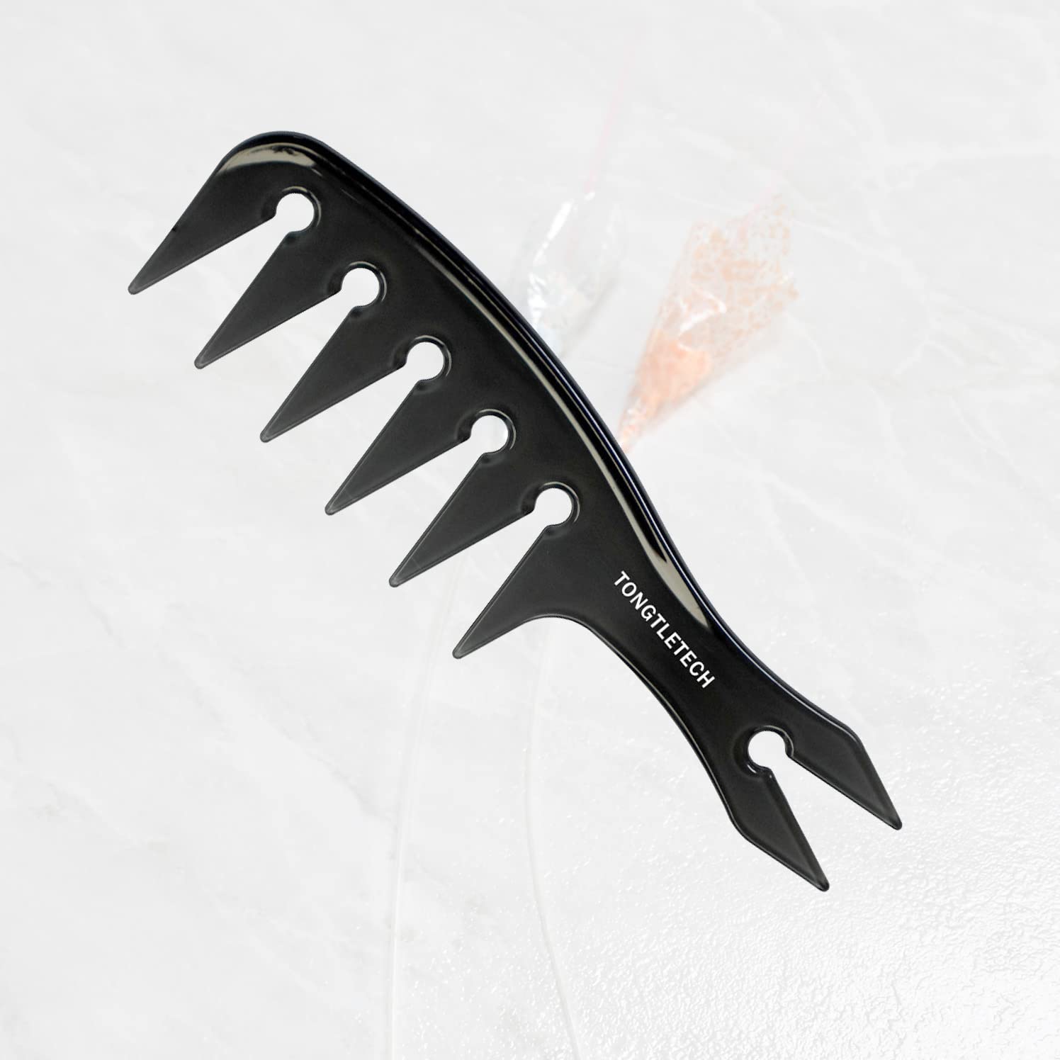 TONGTLETECH Texture Comb compact 15.5 cm fits in bags for on-the-go styling.