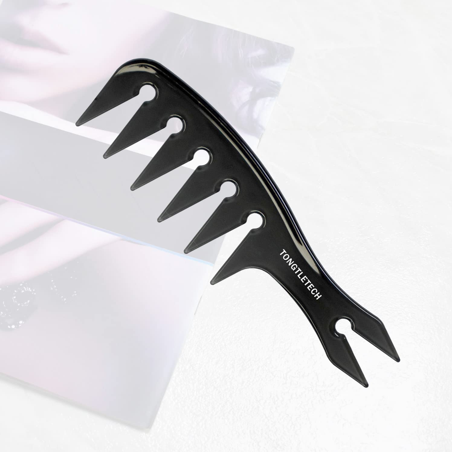 TONGTLETECH Texture Comb in use during a styling session for texture creation.