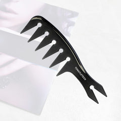 TONGTLETECH Texture Comb in use during a styling session for texture creation.