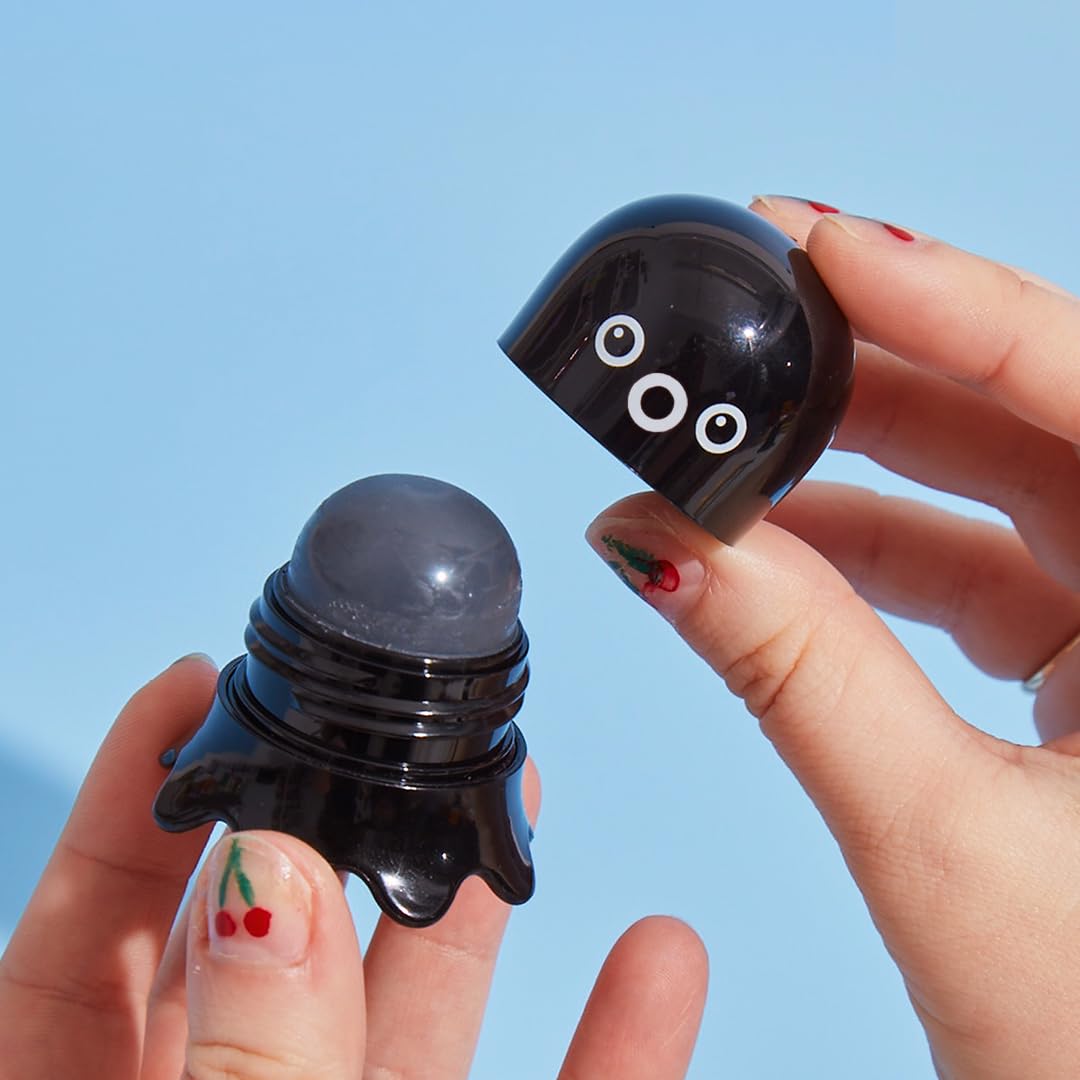 TONYMOLY Tako Pore Scrub Stick close-up of charcoal exfoliant for pore cleansing