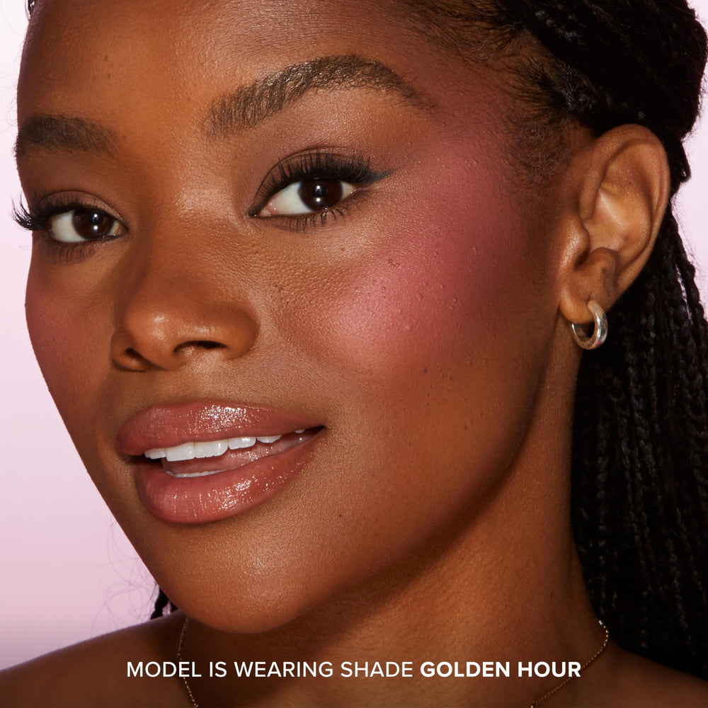 Too Faced Cloud Crush Blurring Blush on cheek shows buildable color swirl.