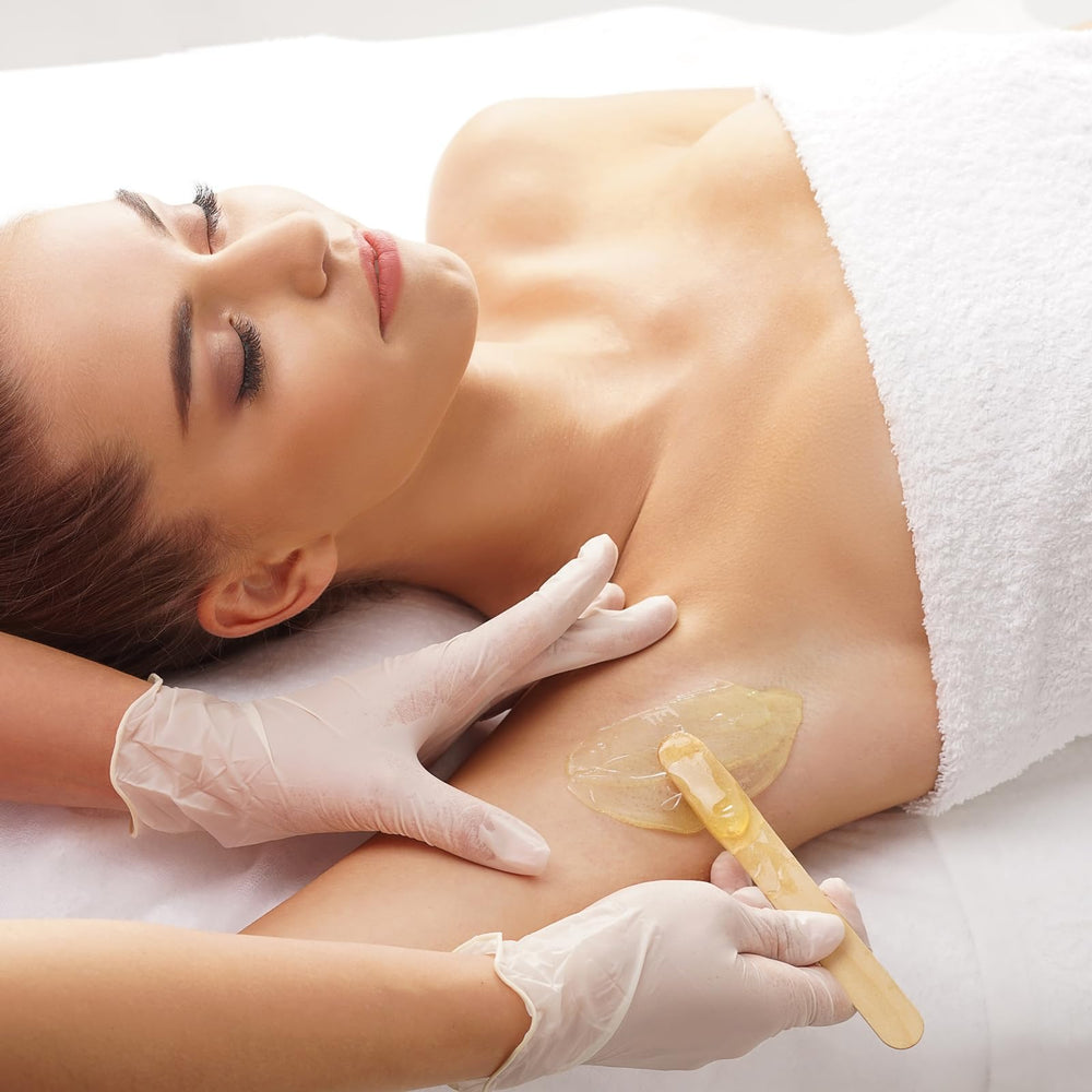 Too Naked translucent gold wax visual conveys premium salon-like finish.