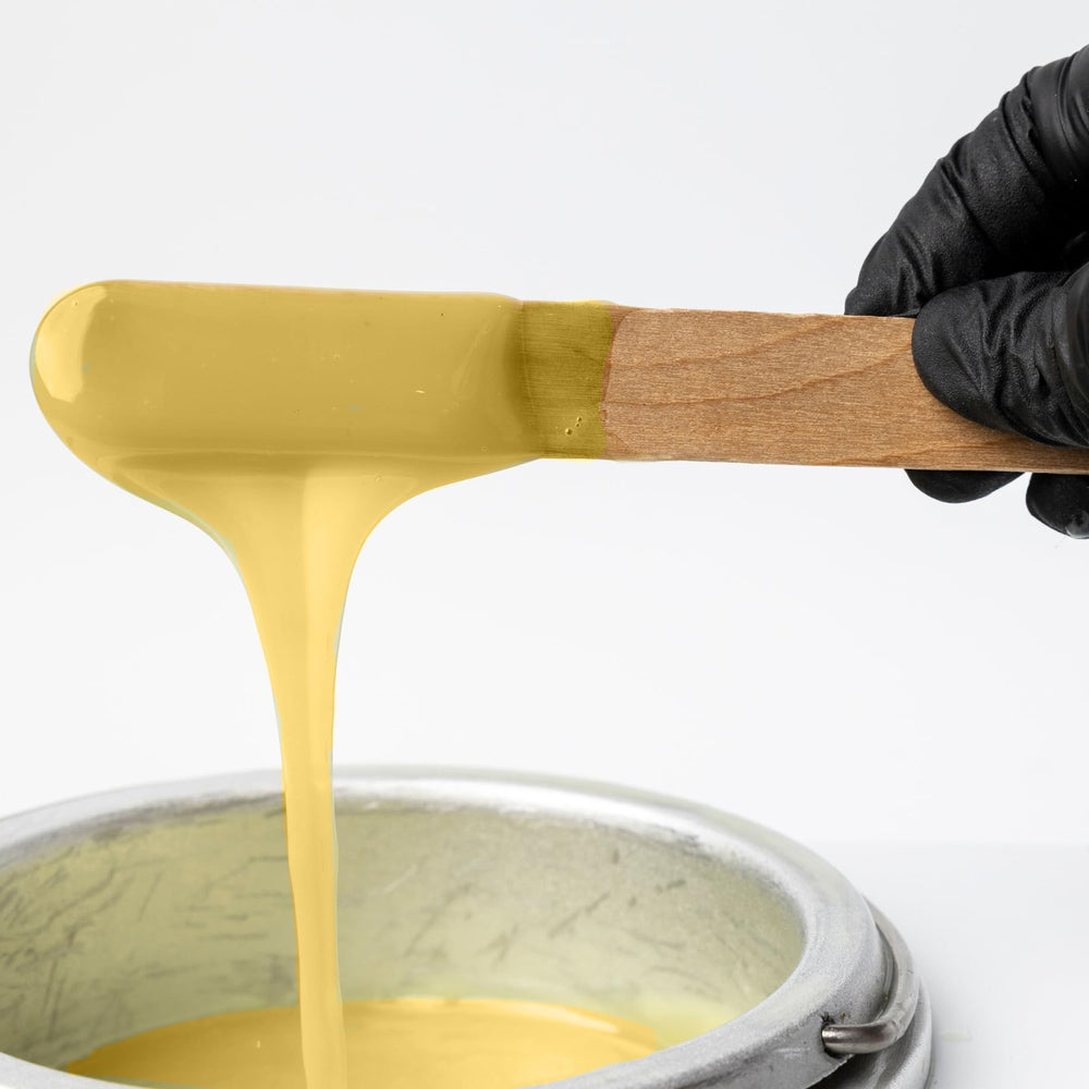 Too Naked spatula-guided application helps with a thin layer for better adhesion.