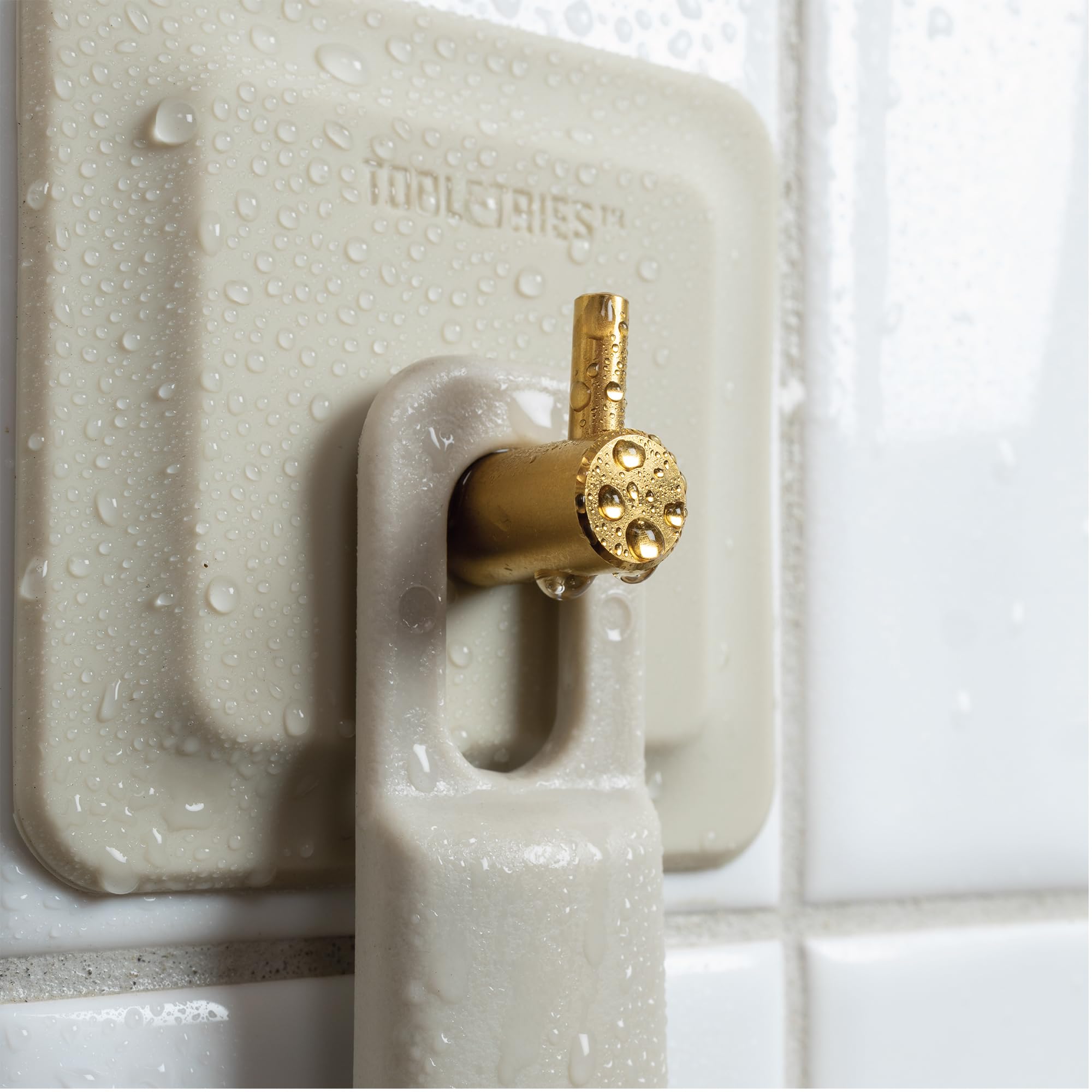 TOOLETRIES packaging includes a removable hook for storage.
