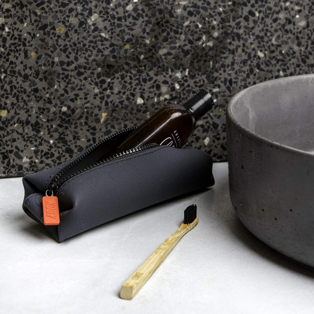 TOOLETRIES Koby Mini silicone cleans easily after travel showers.