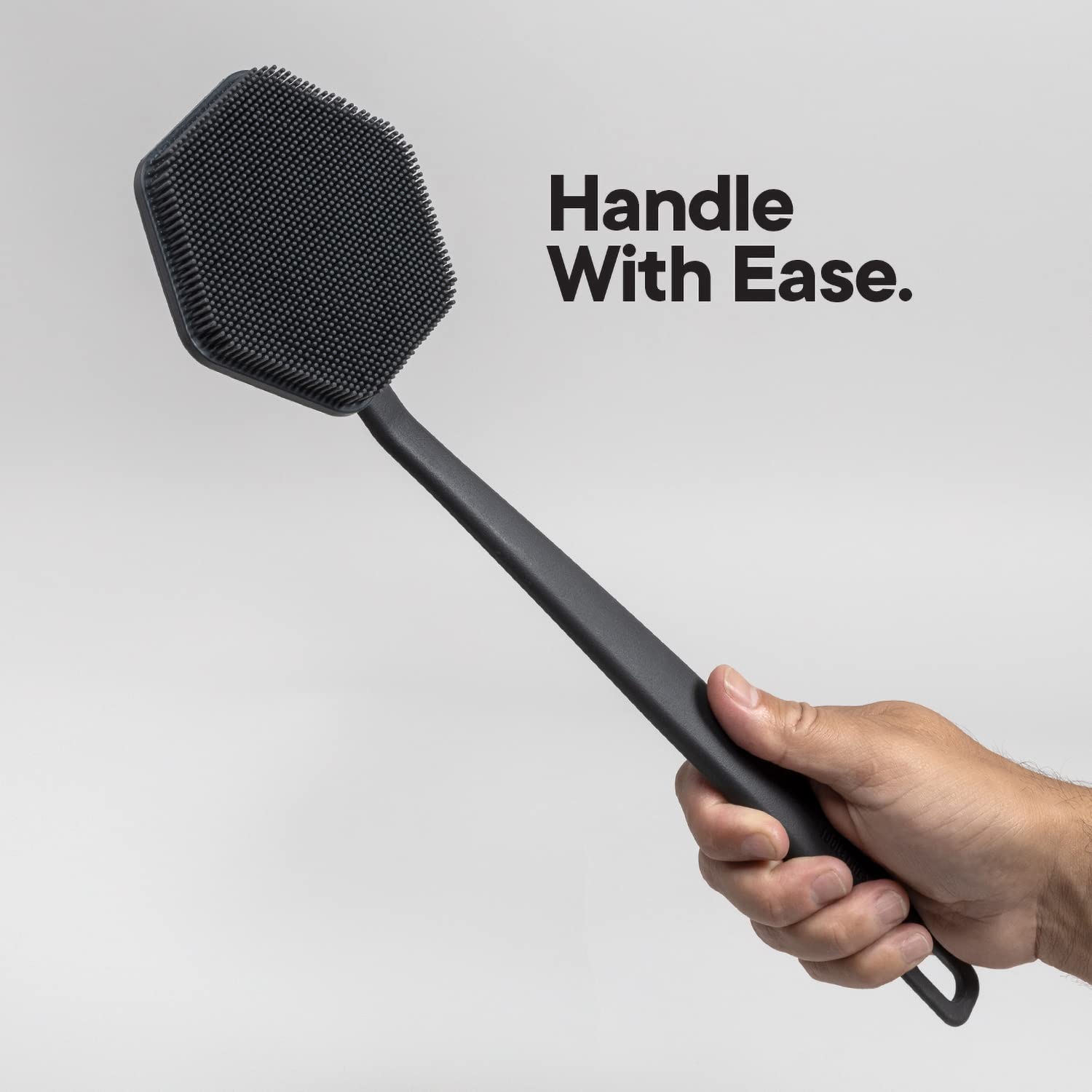 TOOLETRIES silicone back scrubber promotes an invigorating shower routine.