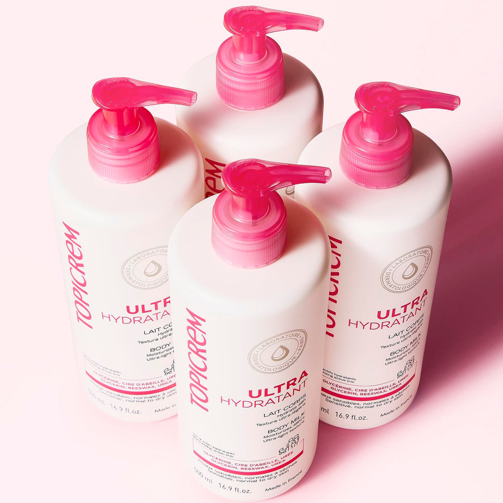 Topicrem body milk on bathroom shelf, part of daily skincare routine.