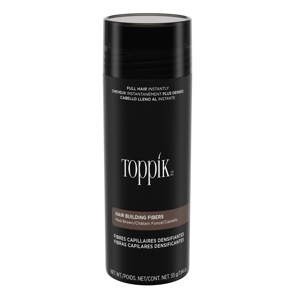 Toppik hair-building fibers in medium brown blend with natural hair for instant fullness.