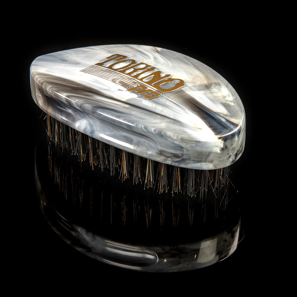 Torino Pro Curve Wave Brush 204 packaging showcases durable wood and premium bristles.