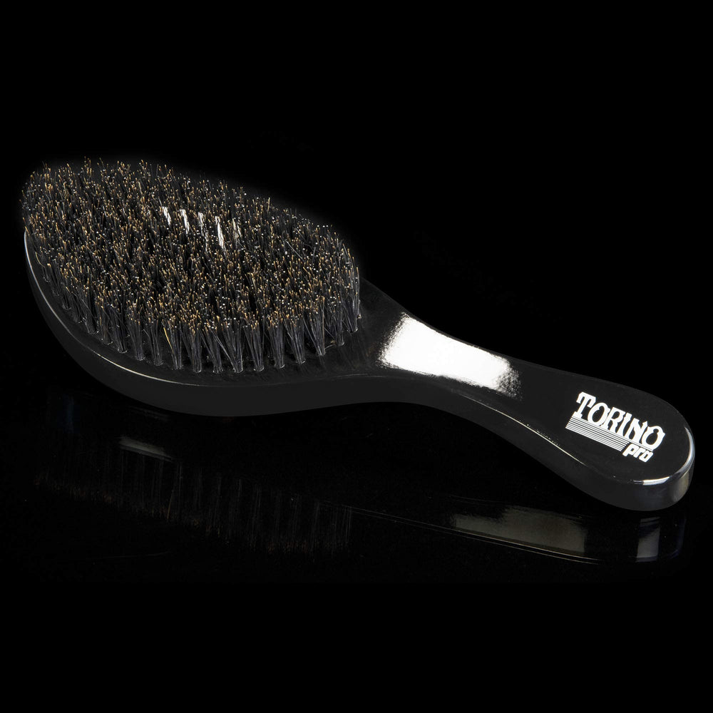 Torino Pro Curve Wave Brush 450 side view highlights curved shape for precise brushing