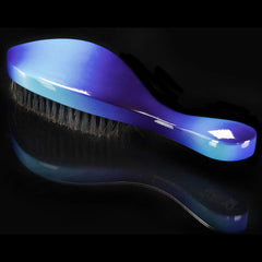Torino Pro Wave Brush handle design improves grip during daily grooming.