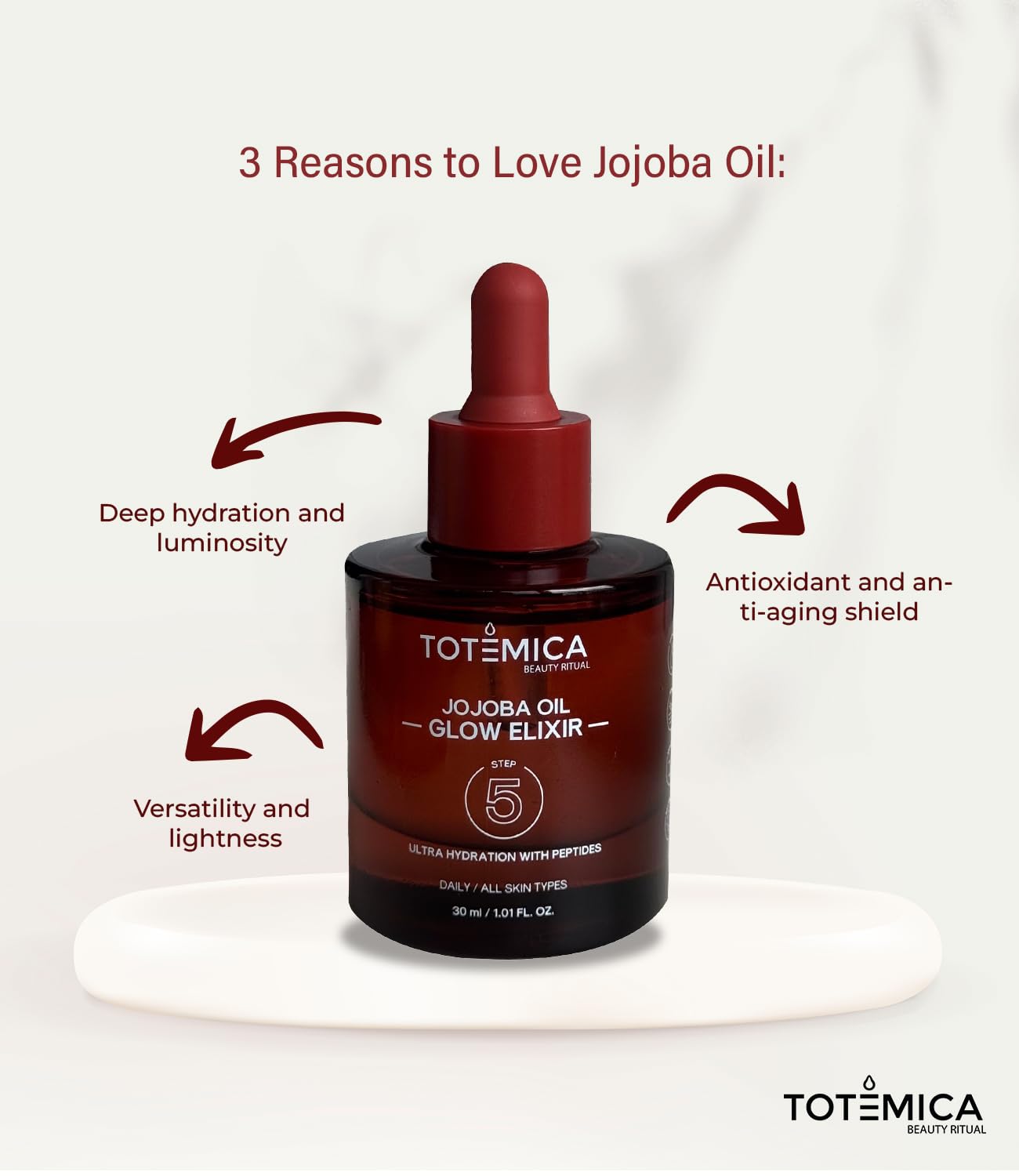 Image of Totemica application hand preparing to apply the oil on skin.