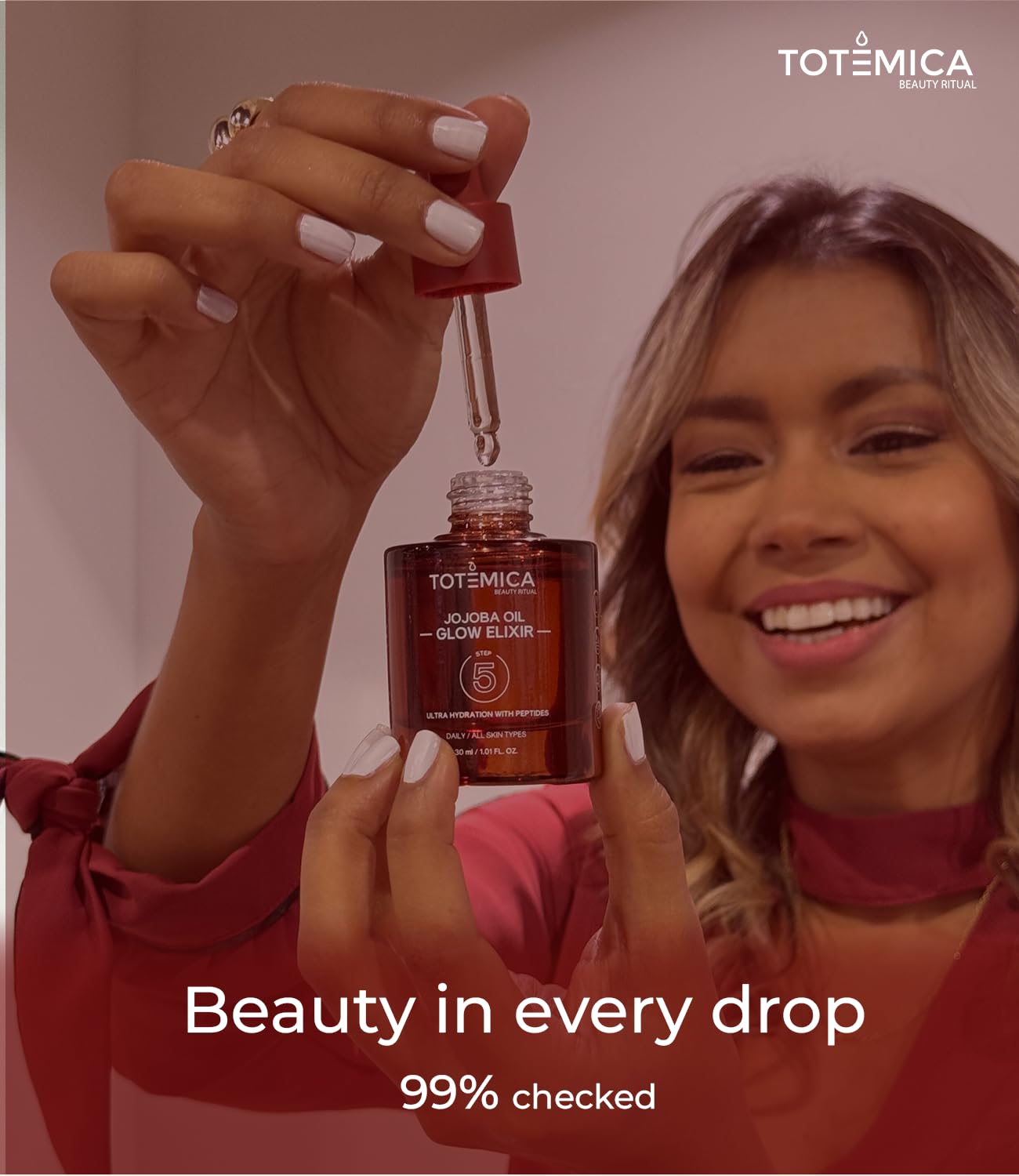 TOTEMICA Glow Elixir label emphasizes vegan, cruelty-free, clean ingredients.
