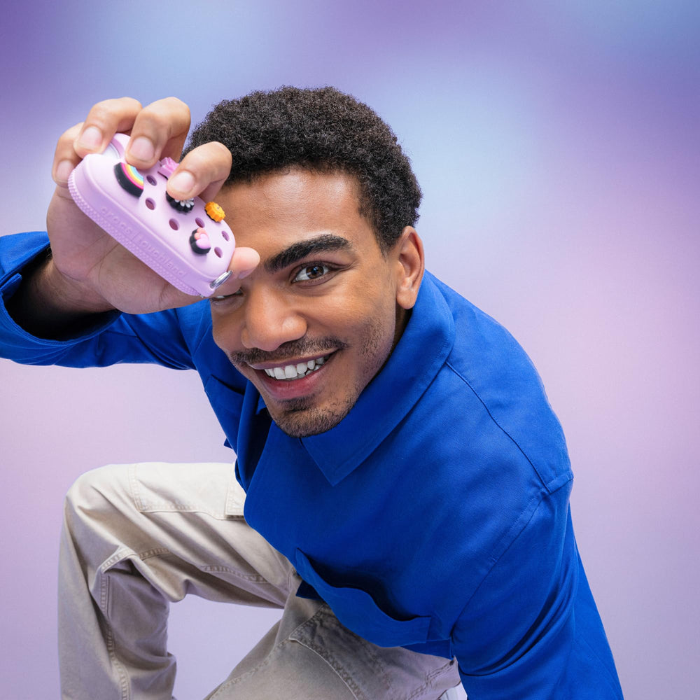 Touchland Crocs Mist Case with five Jibbitz charms adds personal flair