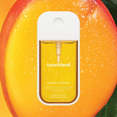 Touchland Mango Mojo travel-size bottle ready for on-the-go refresh.