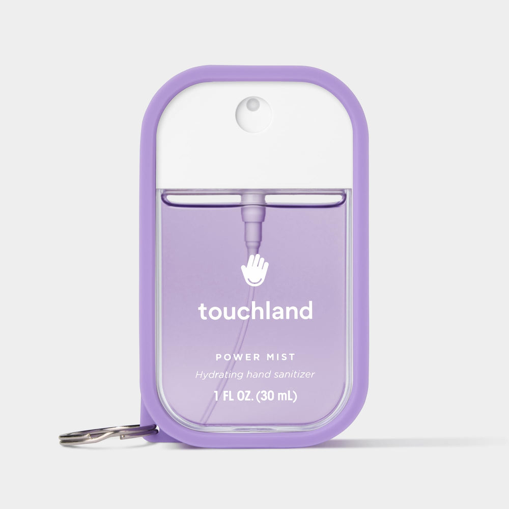 Touchland Purple Haze case attached to bag via clip for portability.