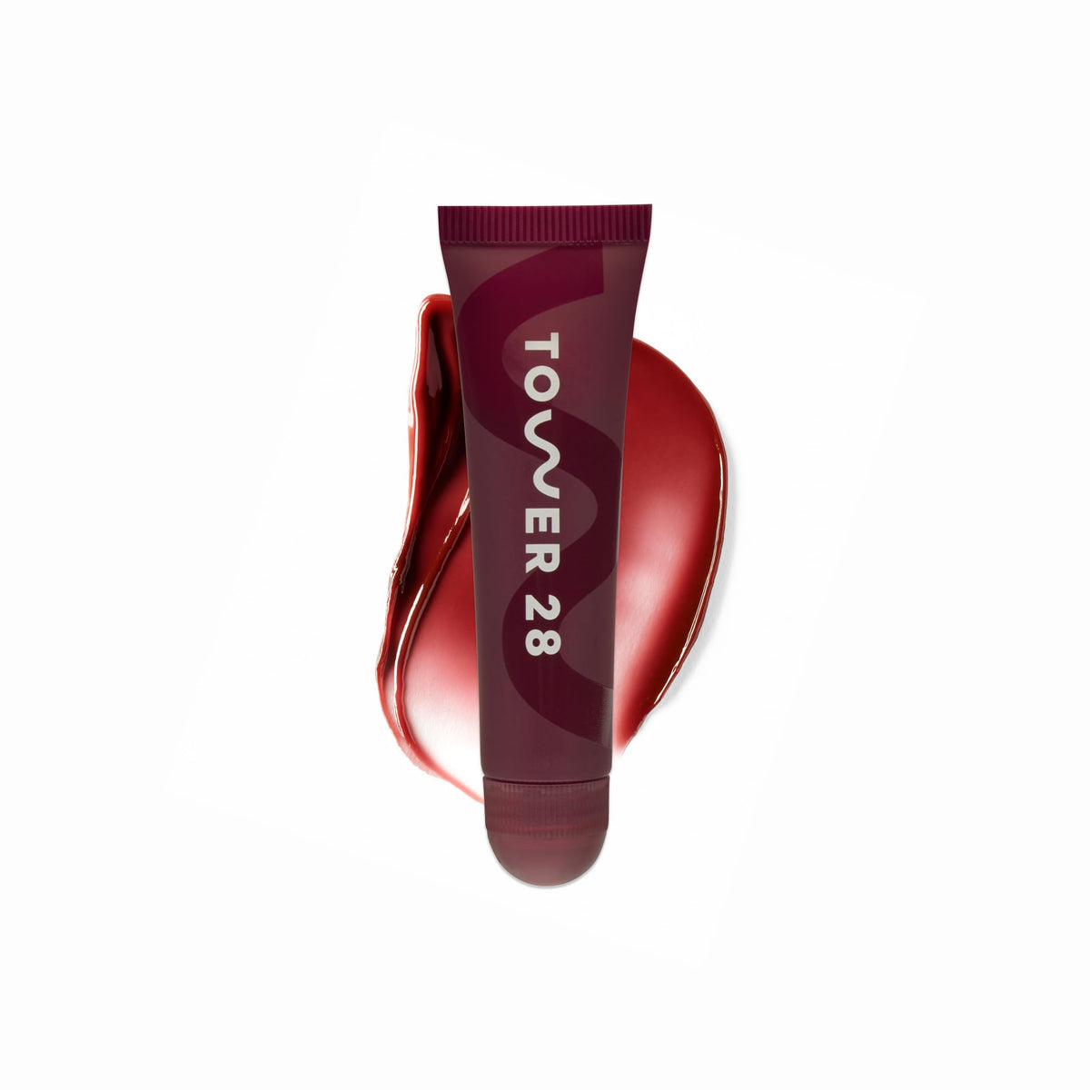 LipSoftie de Tower 28 con aplicador domo para una aplicación suave.