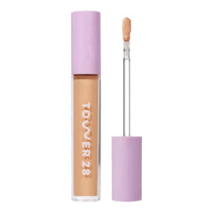 Tower 28 Swipe Serum Concealer swatch showing hydrating, medium coverage for under-eye areas.