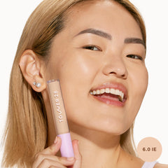 Tower 28 Swipe Serum Concealer swatches reveal shade 6.0 IE with neutral undertones.
