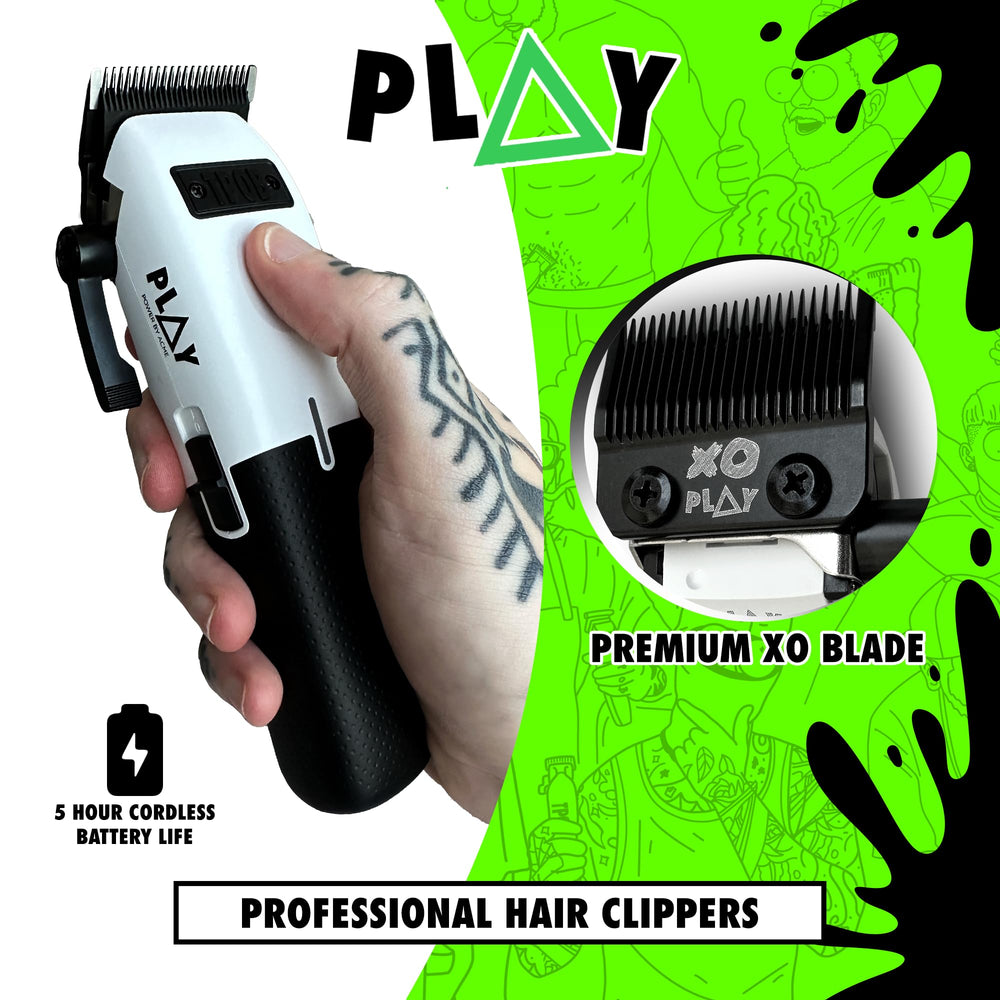 TPOB Play barber clippers side view showing ergonomic rubber grips.