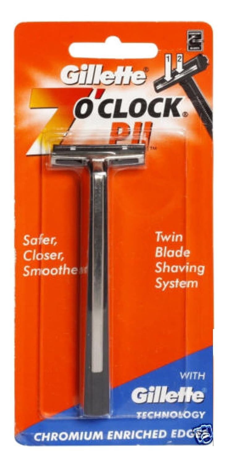 Trac II razor packshot with compatible cartridge and handle for quick shaves.