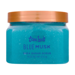 Tree Hut Blue Musk Sugar Scrub envase de 18 onzas para exfoliar e hidratar la piel.