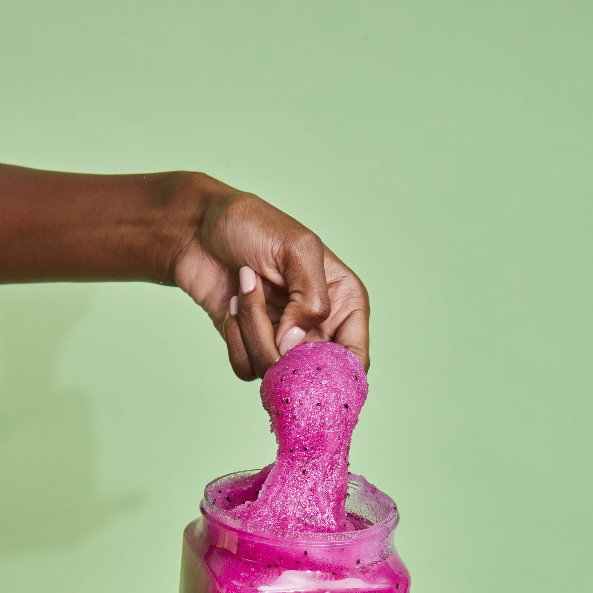 Tree Hut Dragon Fruit Sugar Scrub jar shows nourishing shea butter and six oils.