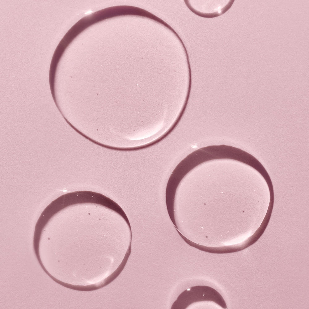 Close-up of the oil blend including grapeseed and rosehip for hydration.