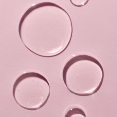 Close-up of the oil blend including grapeseed and rosehip for hydration.
