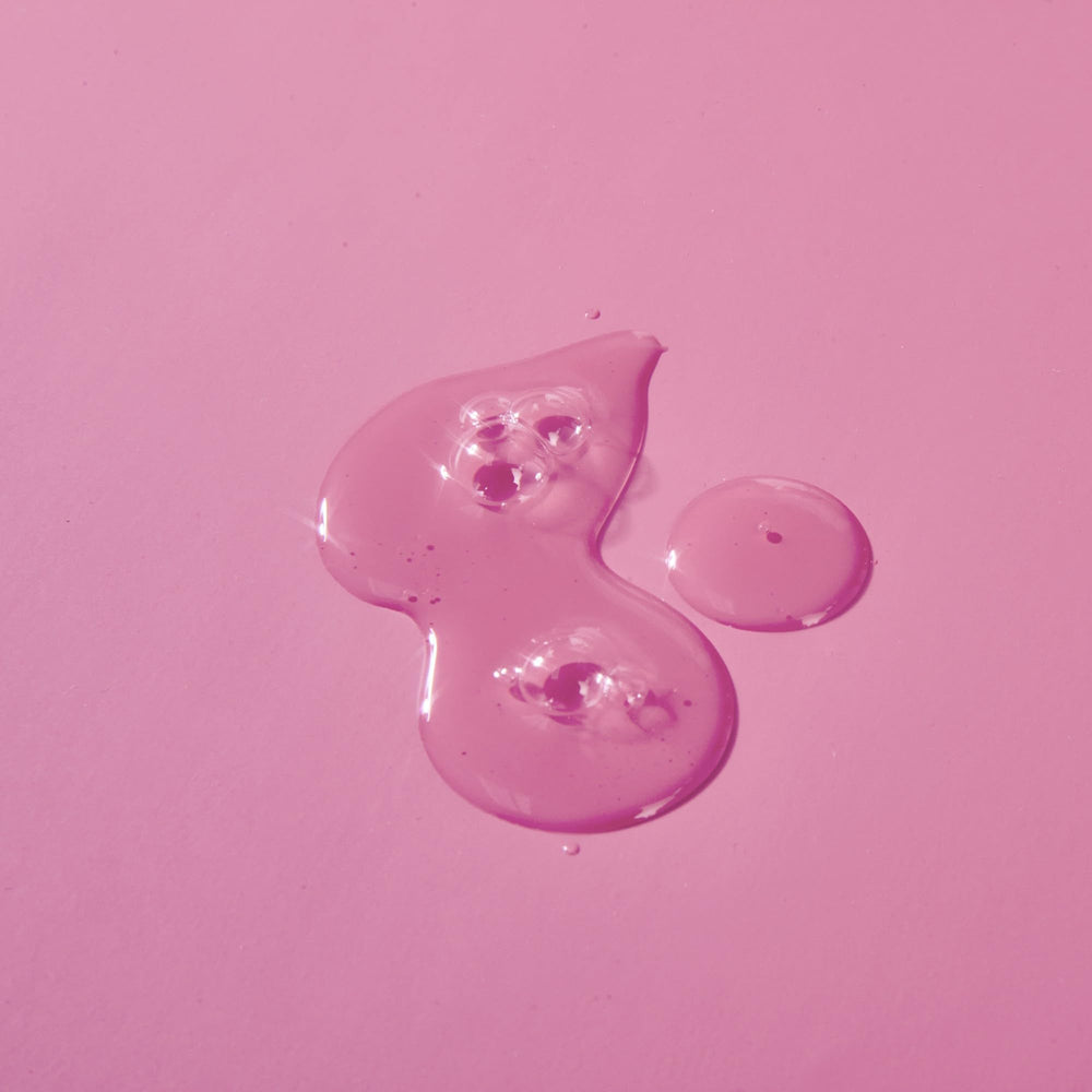 Tree Hut Pink Hibiscus Shave Oil embossed label communicates vegan, paraben-free credentials.
