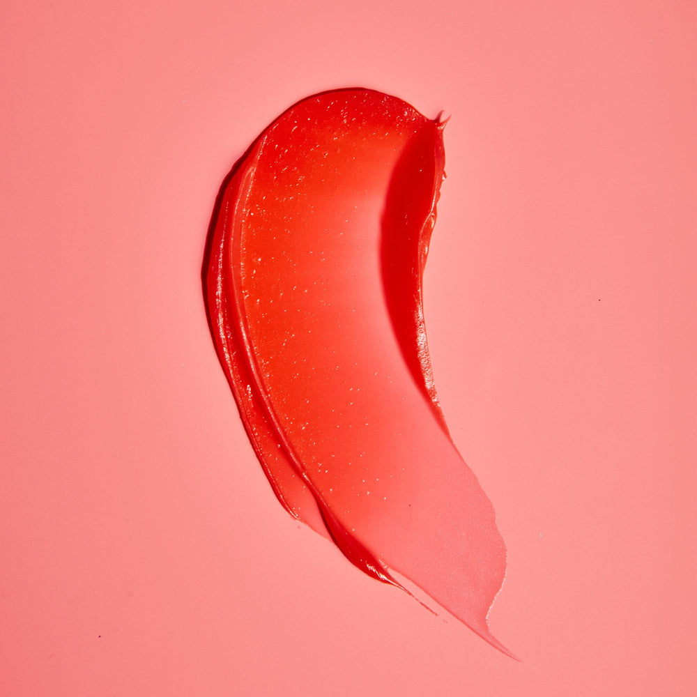 Tree Hut packaging of Strawberry Sugarlips Lip Butter on shelf for on-the-go use