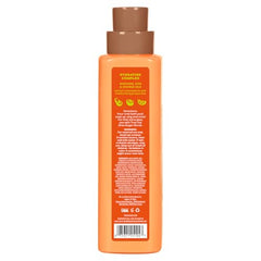 Tree Hut Tangerine: primer plano de la espuma cremosa en la botella
