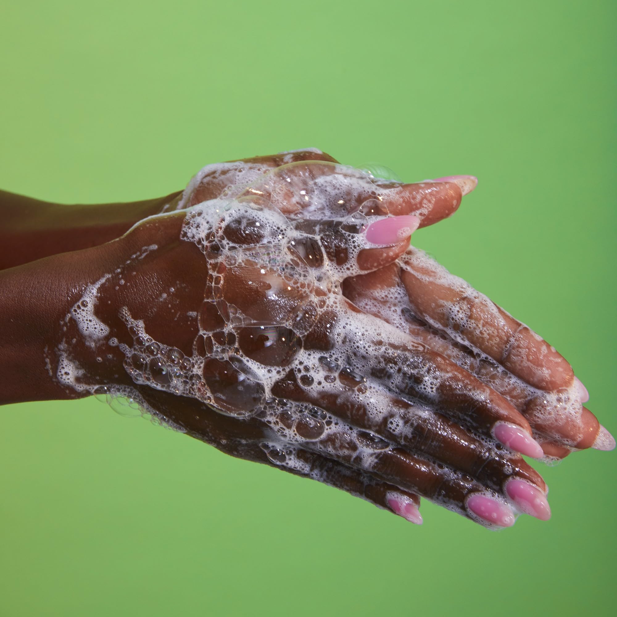 Rich foam from Tree Hut Tangerine Serum-Infused Hand Wash ready to cleanse hands.
