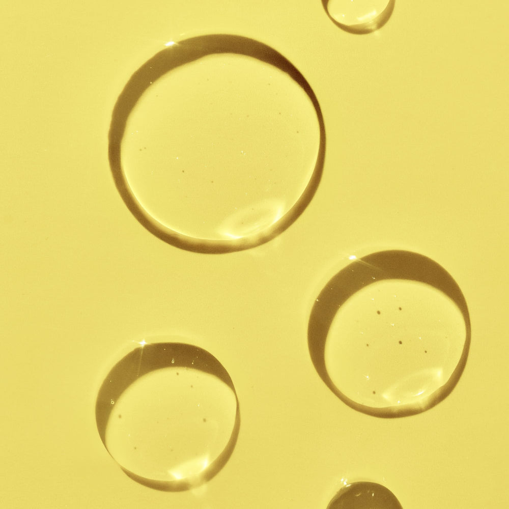 Tree Hut Tropic Glow Pistachio Oil drop indicates lasting moisture.