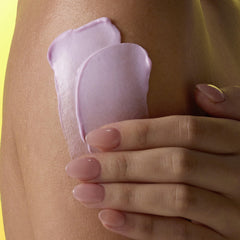 Tree Hut Violet Victory butter being applied for smooth, moisturized skin
