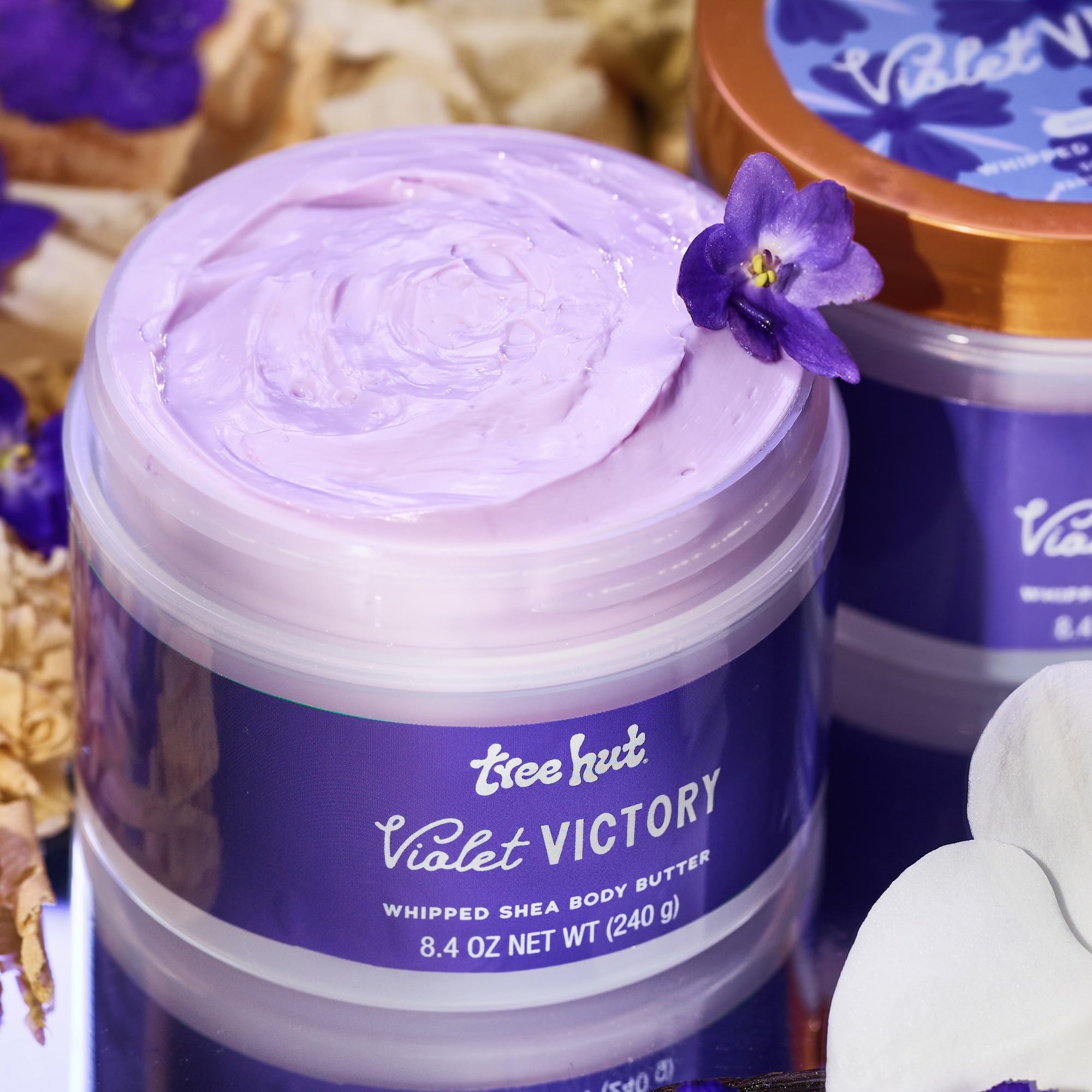 Tree Hut Violet Victory bottle with sugared violet scent notes visible