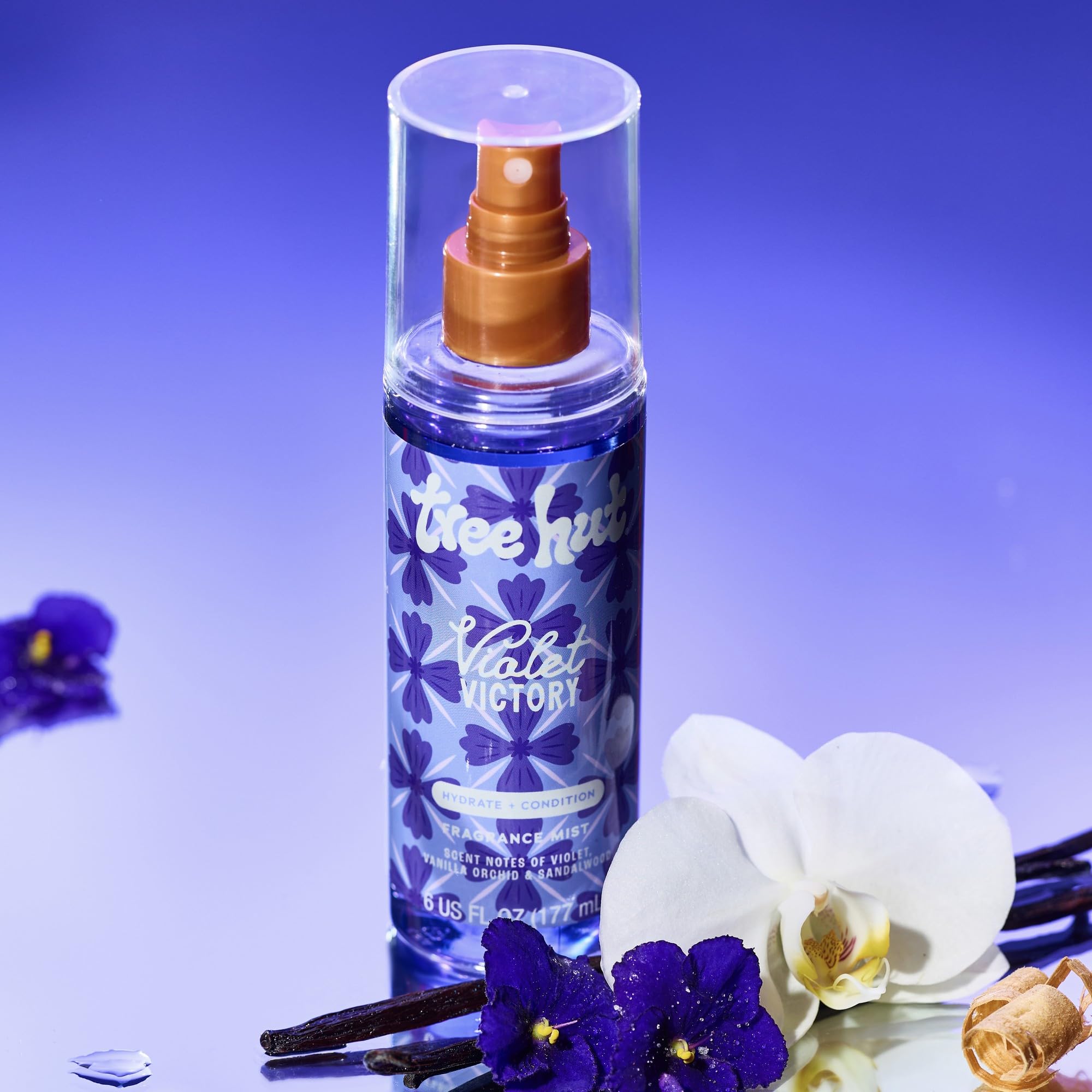 Tree Hut Violet Victory fragrance mist application on skin provides subtle refreshment.