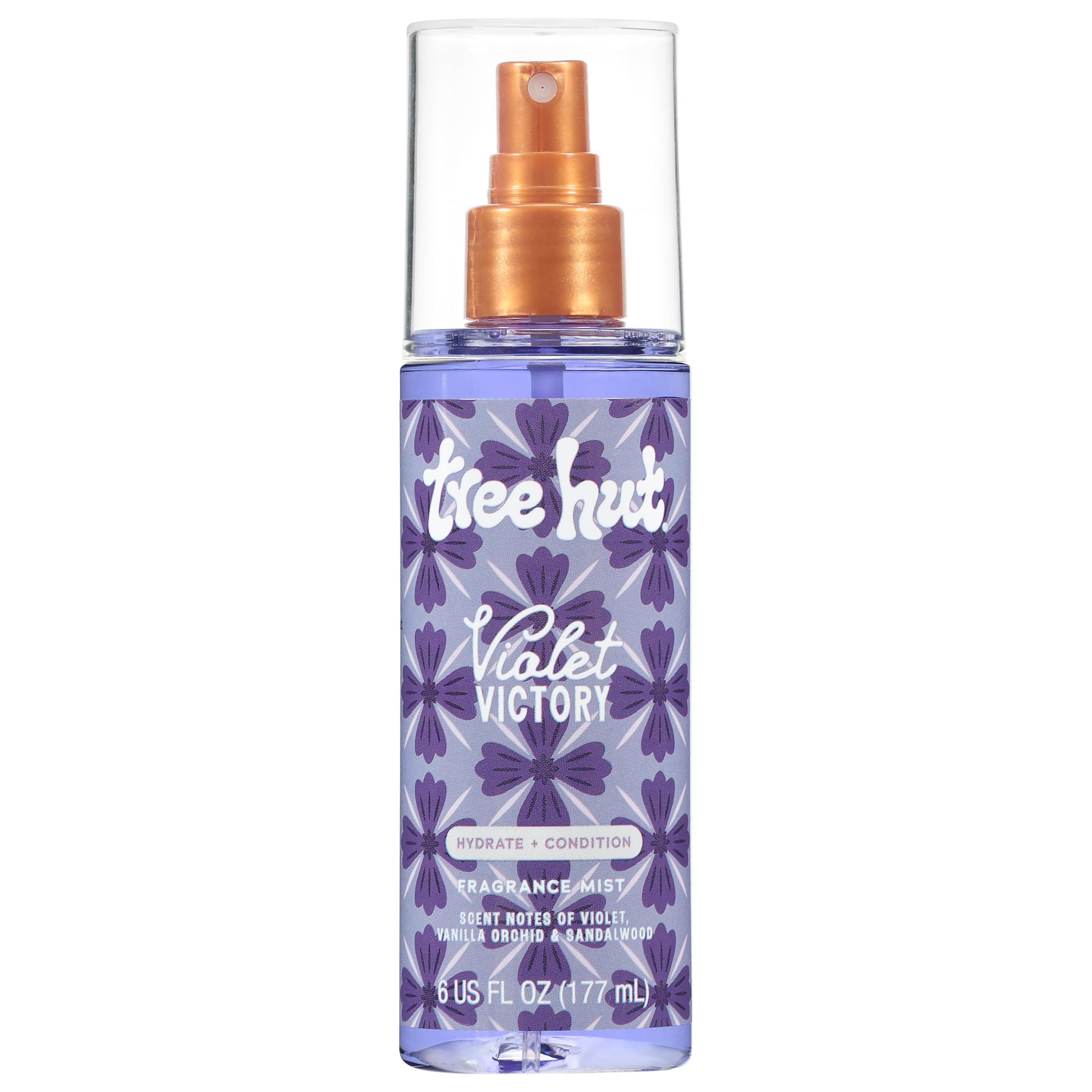 Tree Hut Violet Victory fragrance mist bottle on vanity, offering hydration and a calming scent.