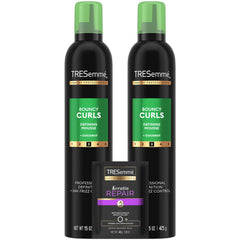 TRESemmé Defining Mousse bottle delivers bouncy curls with lightweight hold.