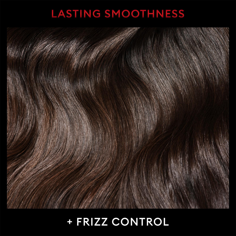 TRESemmé Detangler in-use demonstrating easier combing through knots.