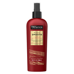 TRESemmé Expert Selection Heat Protection Spray bottle ready for heat styling, protecting hair.