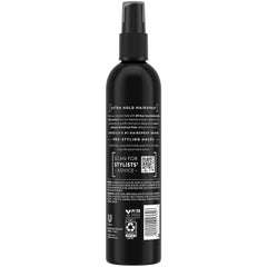 Tresemmé Extra Hold Hairspray spray mist showing even distribution for control.