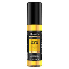 TRESemmé Lamellar Gloss Oil bottle pour for instant shine and smoothness